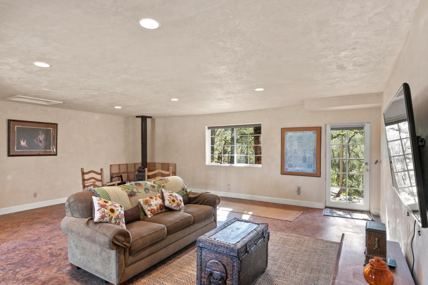 38025 Poppy Tree Lane Carmel Valley, CA 93924 - Photo 31 of 47 a living room with furniture and a window