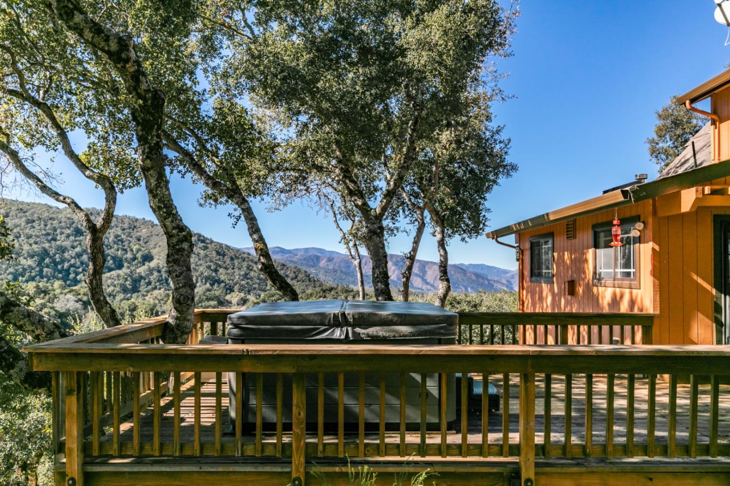 38025 Poppy Tree Lane Carmel Valley, CA 93924 - Photo 33 of 47 a wooden deck with trees