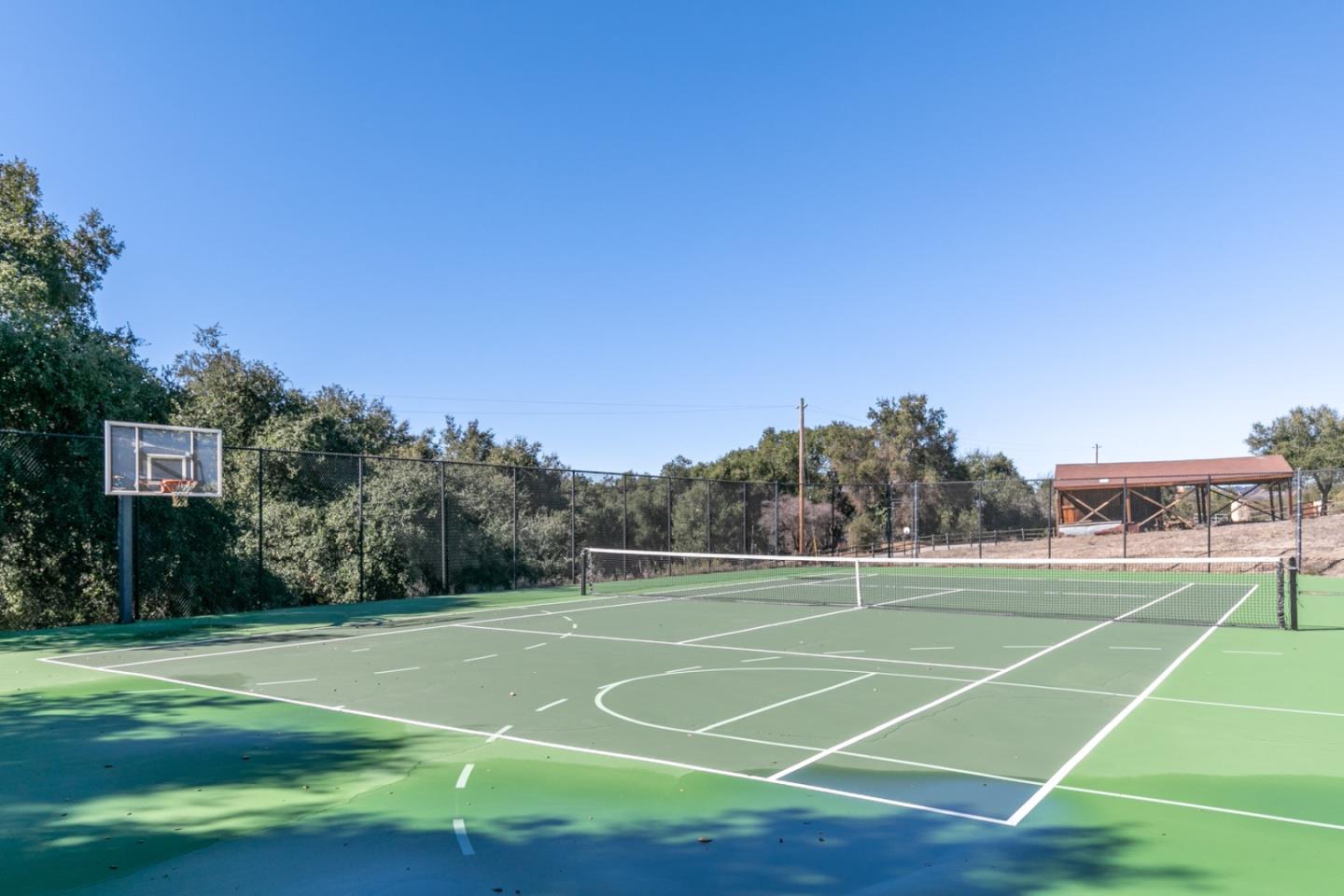 38025 Poppy Tree Lane Carmel Valley, CA 93924 - Photo 41 of 47 a view of a tennis court