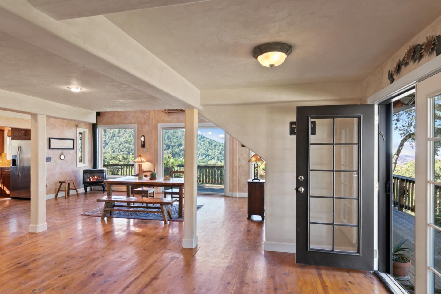 38025 Poppy Tree Lane Carmel Valley, CA 93924 - Photo 7 of 47 a living room with furniture and a large window
