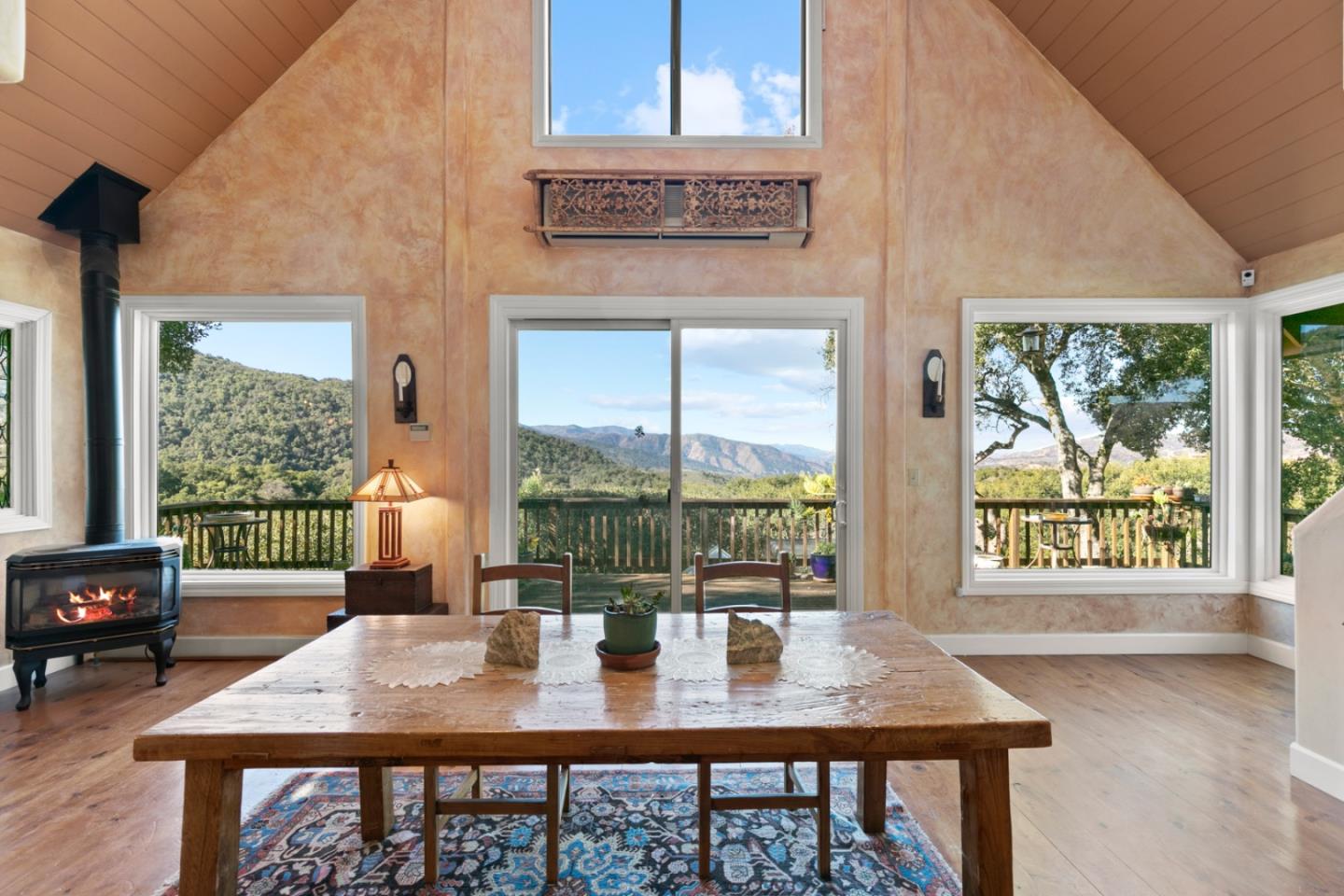 38025 Poppy Tree Lane Carmel Valley, CA 93924 - Photo 9 of 47 a view of a dining room with furniture window and outside view