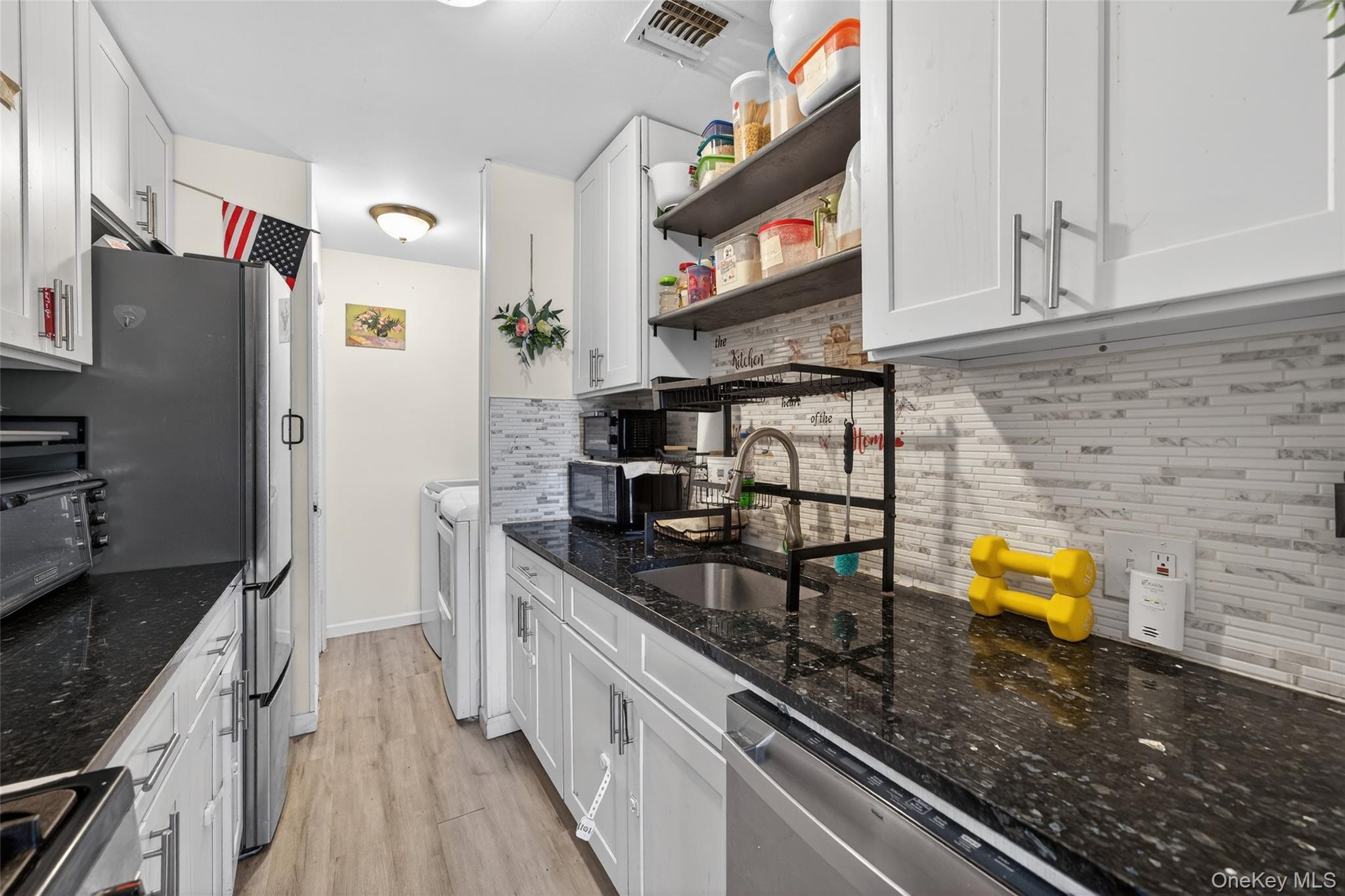 276 Temple Hill Road, Unit 2414 New Windsor, NY 12553 - Photo 14 of 29 a kitchen with stainless steel appliances granite countertop a refrigerator and a stove