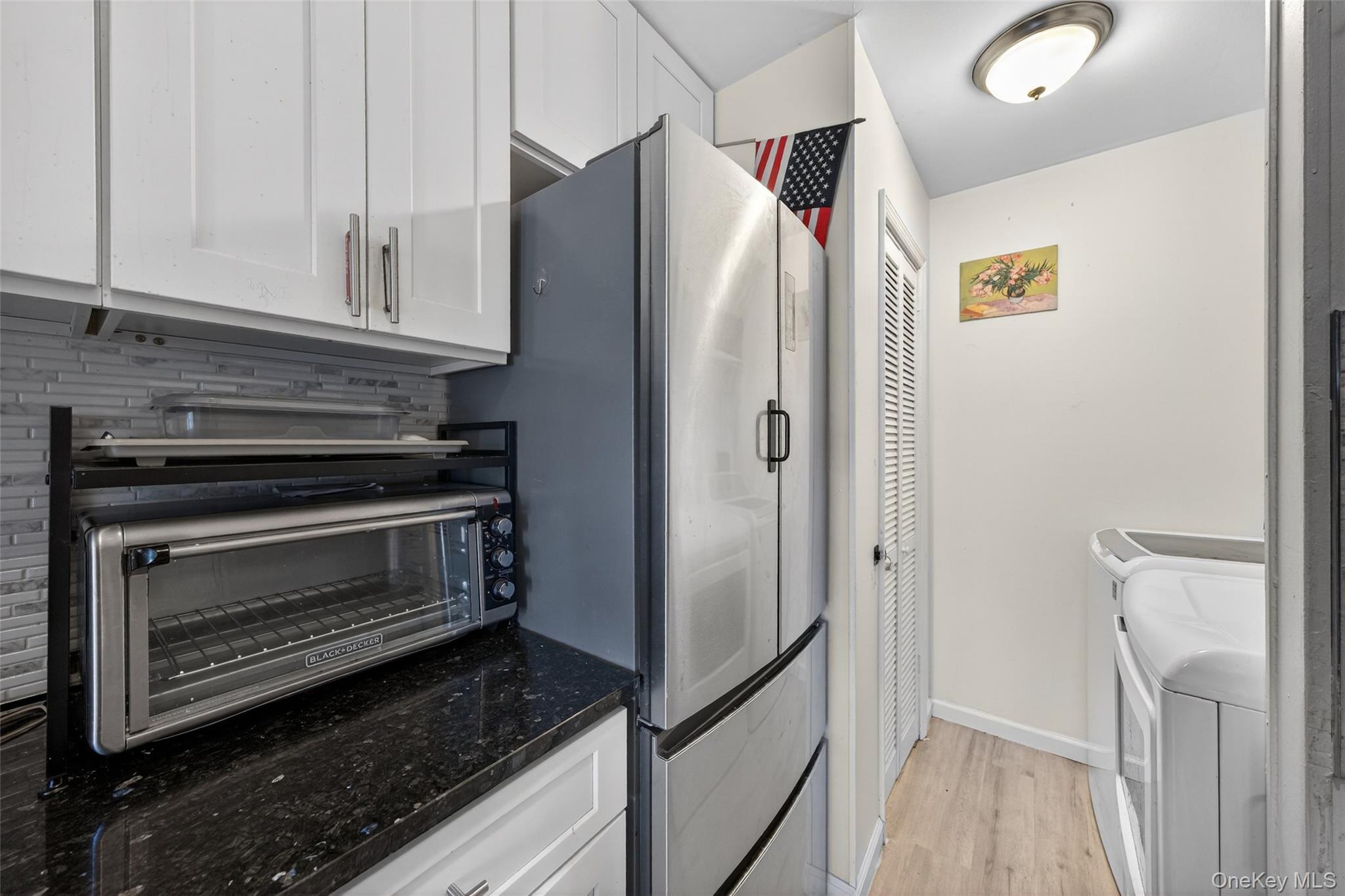 276 Temple Hill Road, Unit 2414 New Windsor, NY 12553 - Photo 15 of 29 a kitchen with granite countertop a refrigerator and a stove