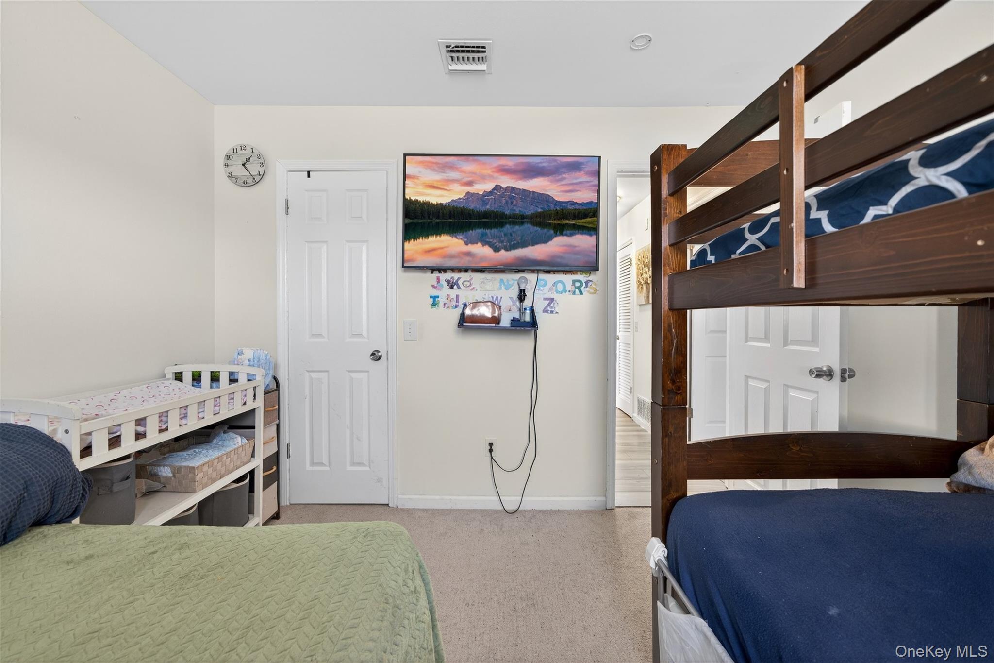 276 Temple Hill Road, Unit 2414 New Windsor, NY 12553 - Photo 20 of 29 a bedroom with bed and window