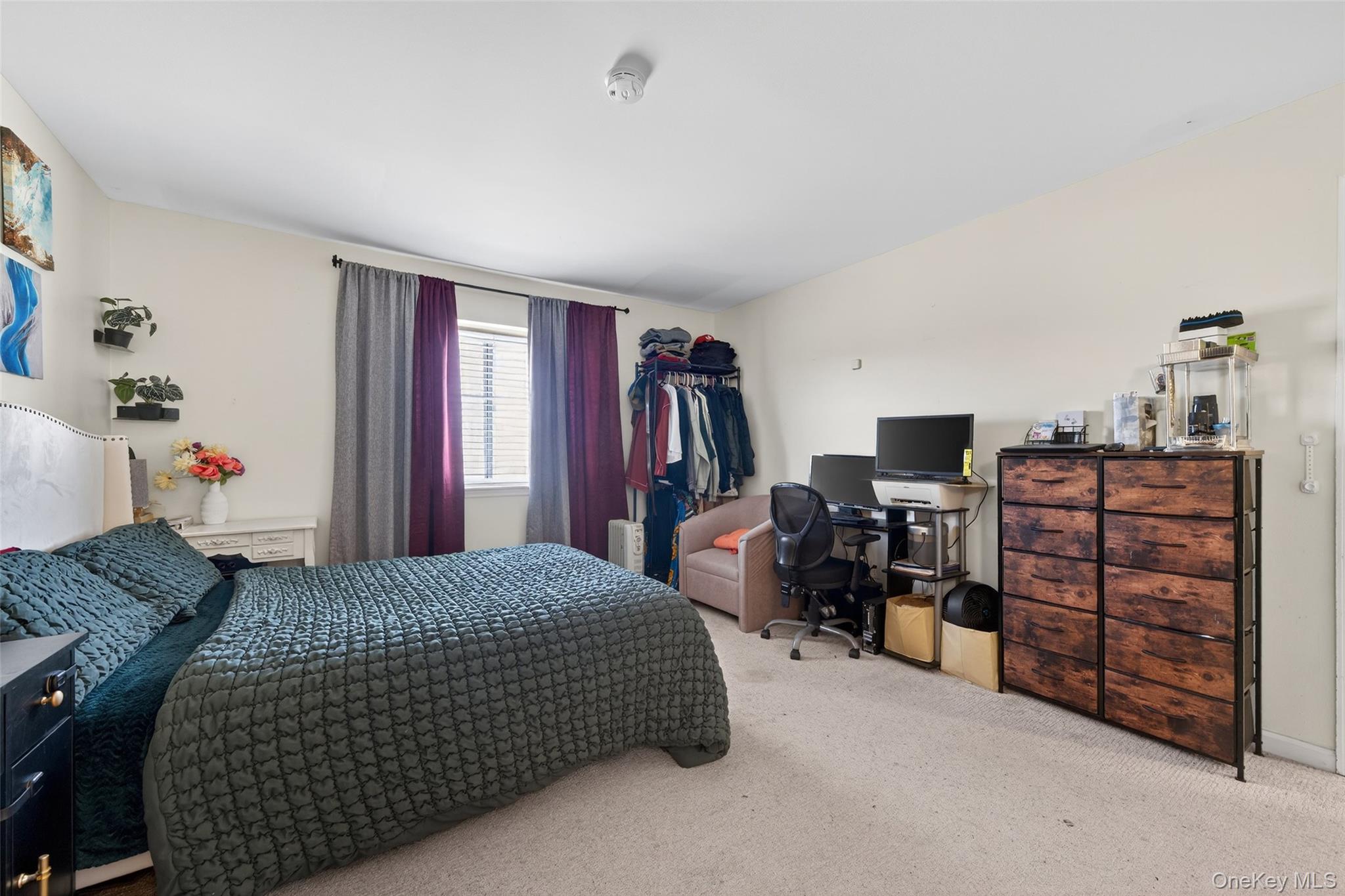 276 Temple Hill Road, Unit 2414 New Windsor, NY 12553 - Photo 22 of 29 a bedroom with a bed and furniture