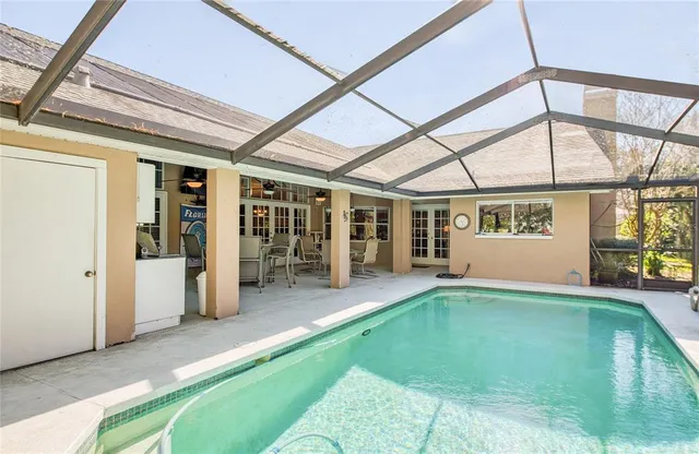 a view of yard with swimming pool