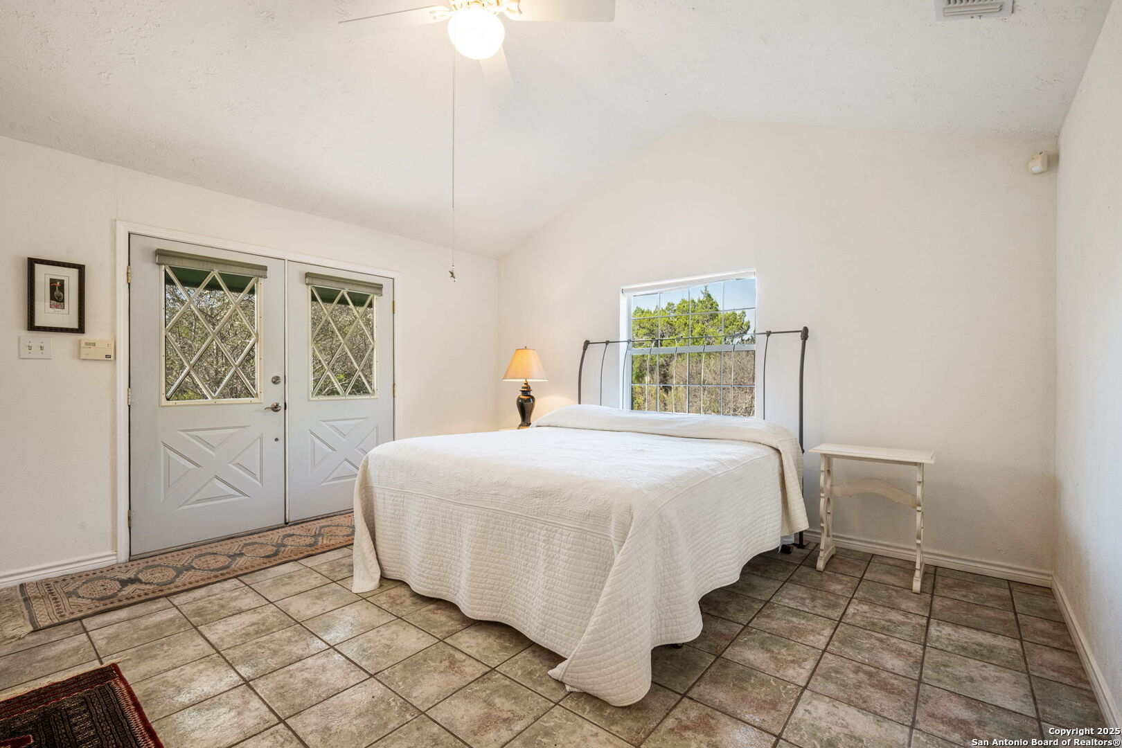 305 Spanish Pass Road Boerne, TX 78006 - Photo 104 of 105 a bedroom with a bed and a window