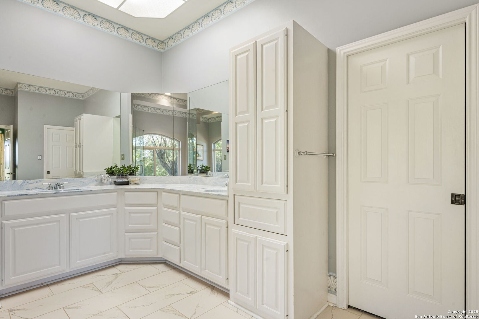 305 Spanish Pass Road Boerne, TX 78006 - Photo 23 of 105 a spacious bathroom with a double vanity sink and a mirror