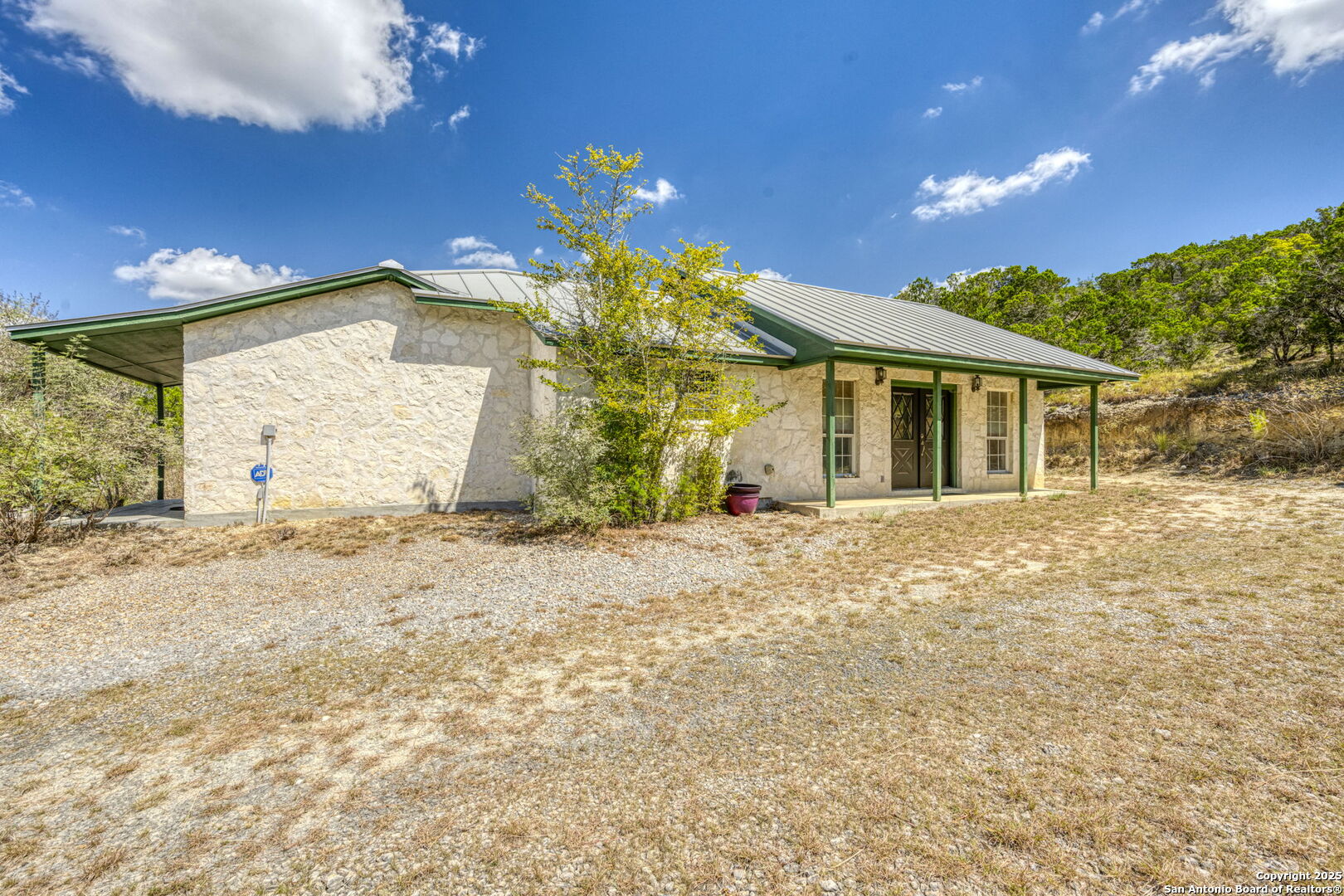 305 Spanish Pass Road Boerne, TX 78006 - Photo 31 of 105 a view of a house with a backyard