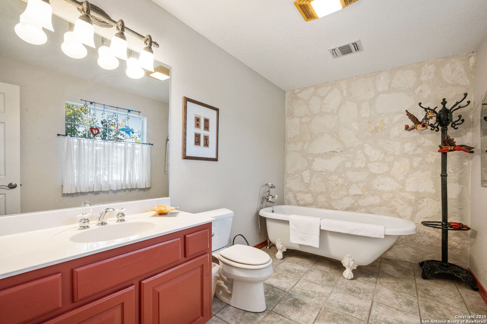 305 Spanish Pass Road Boerne, TX 78006 - Photo 32 of 105 a bathroom with a sink toilet and a bathtub