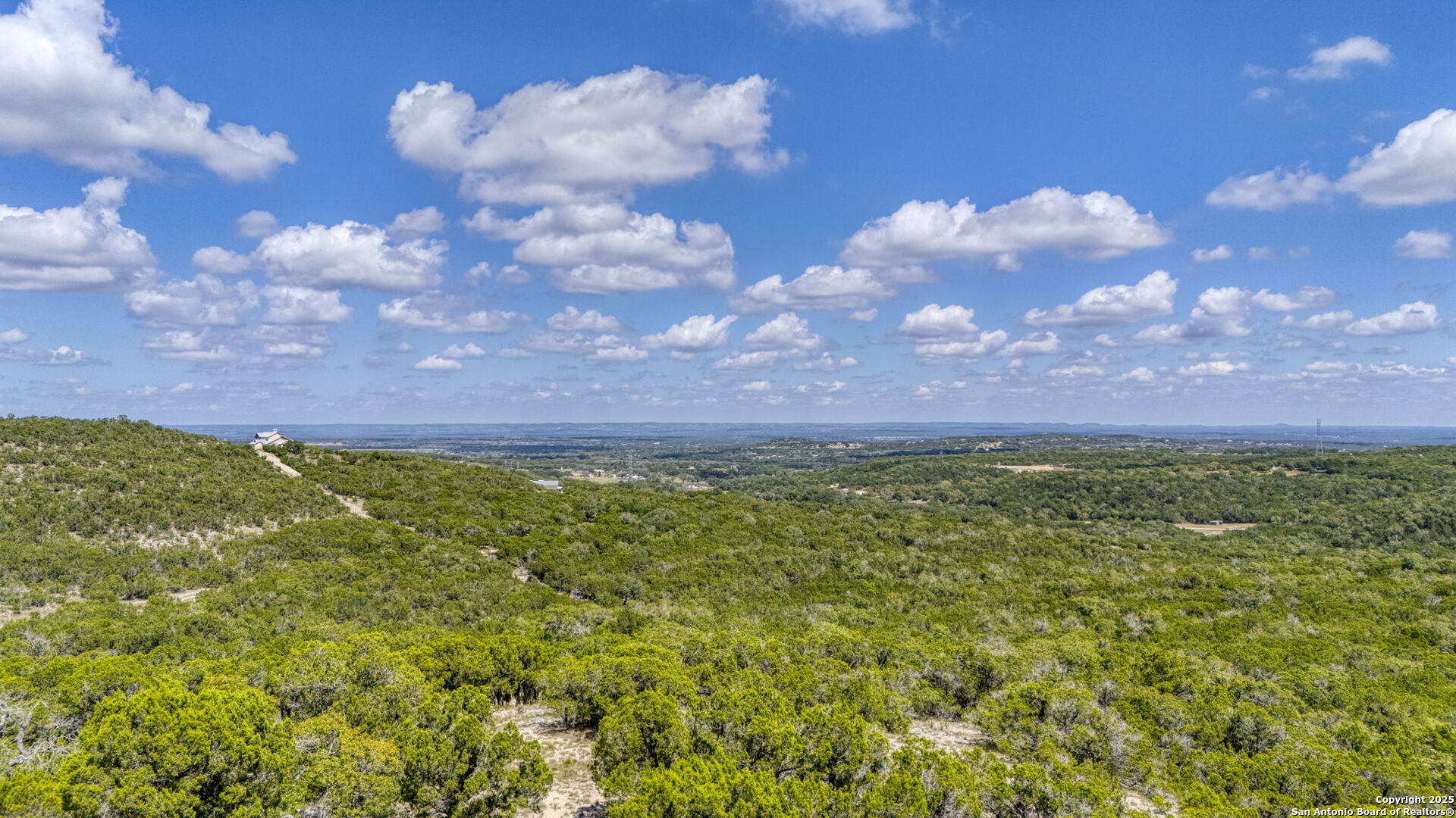 305 Spanish Pass Road Boerne, TX 78006 - Photo 84 of 105 a view of a big yard with lots of green space