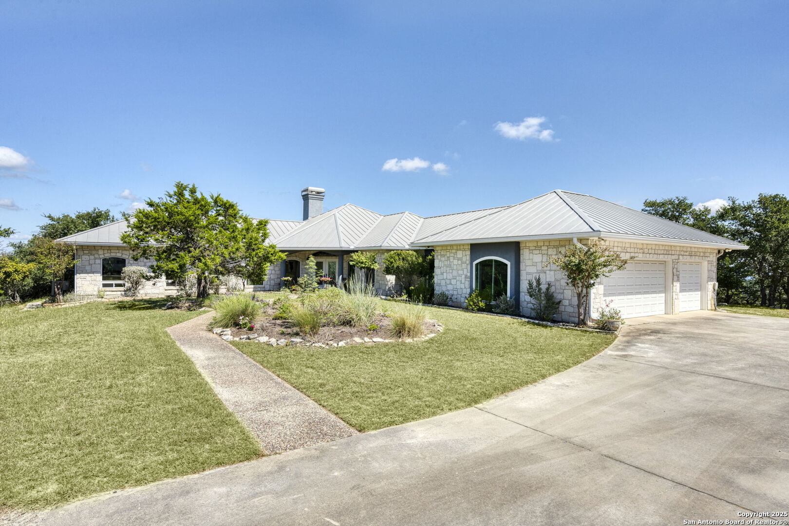 305 Spanish Pass Road Boerne, TX 78006 - Photo 90 of 105 a front view of house with yard and trees