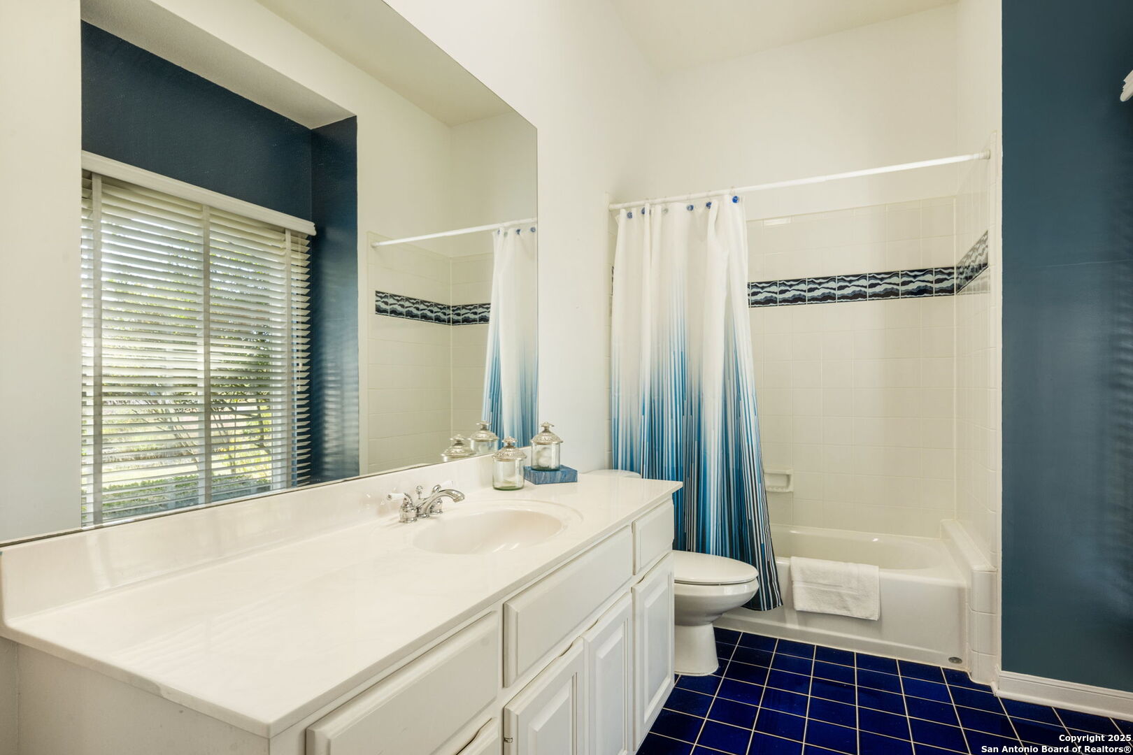 305 Spanish Pass Road Boerne, TX 78006 - Photo 98 of 105 a bathroom with a sink a toilet and shower