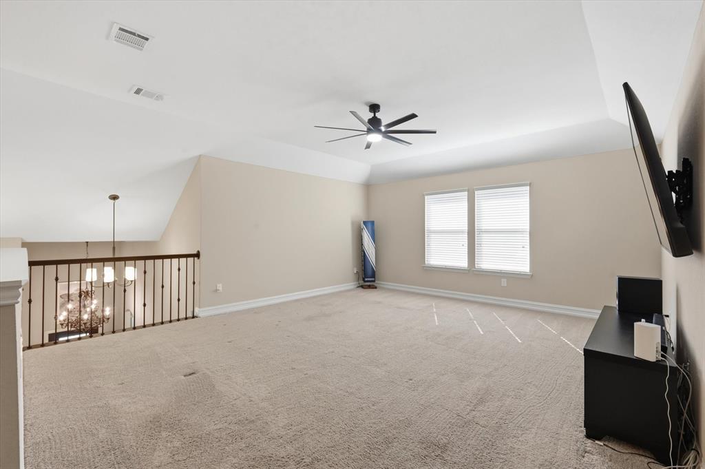 824 Pinnacle Ridge Road Fort Worth, TX 76052 - Photo 32 of 40 a view of an empty room with a window