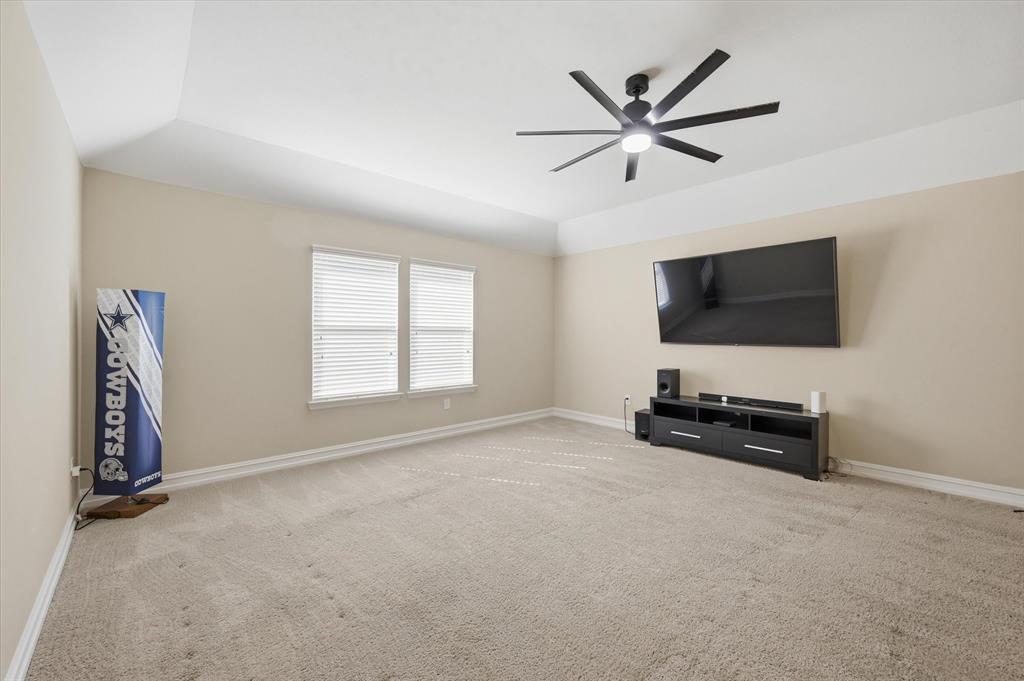 824 Pinnacle Ridge Road Fort Worth, TX 76052 - Photo 34 of 40 a living room with flat screen tv and a window
