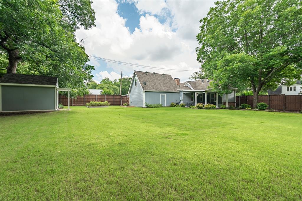 9121 6th Street Frisco, TX 75033 - Photo 25 of 27 a view of a house with a yard