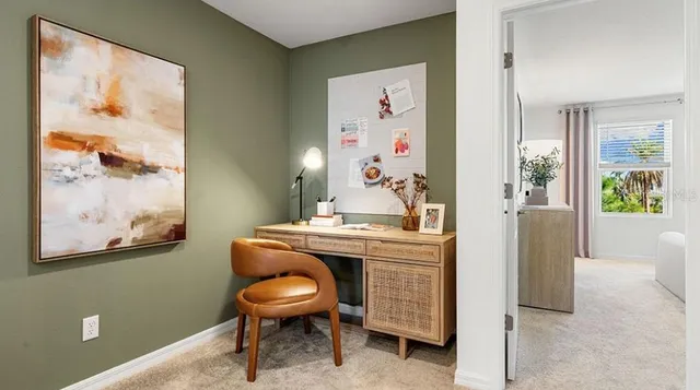 a bed room with a bed and a chair