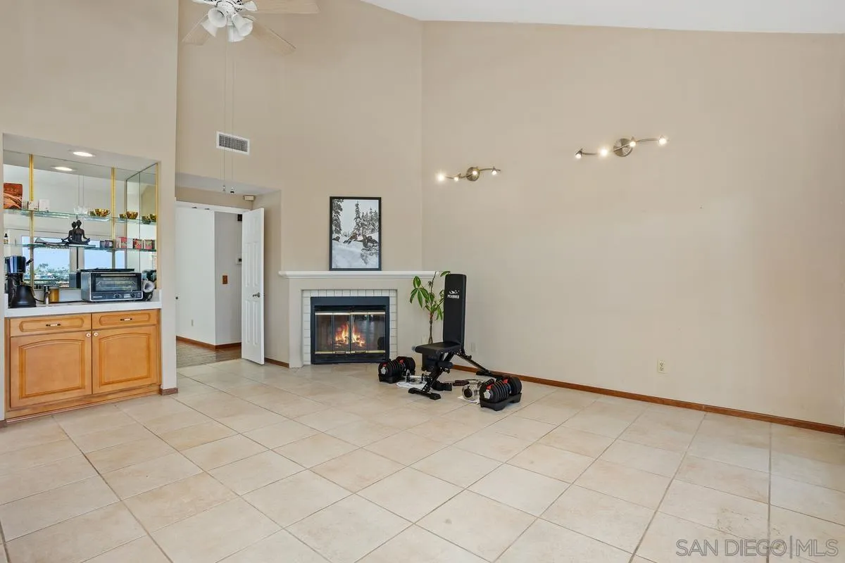15089 Tierra Alta Del Mar, CA 92014 - Photo 12 of 25 a view of a livingroom with furniture and a fireplace