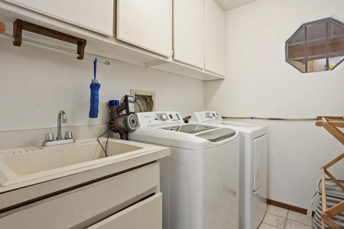 15089 Tierra Alta Del Mar, CA 92014 - Photo 19 of 25 a utility room with dryer and washer