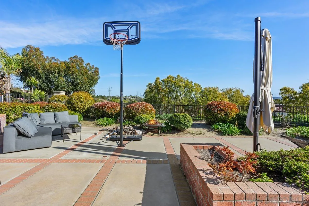 15089 Tierra Alta Del Mar, CA 92014 - Photo 21 of 25 a view of a swimming pool with a patio