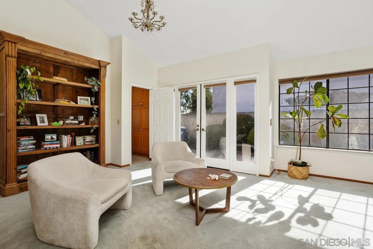 15089 Tierra Alta Del Mar, CA 92014 - Photo 10 of 25 a living room with furniture and a large window