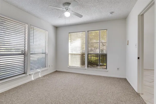 a view of a room with a large window