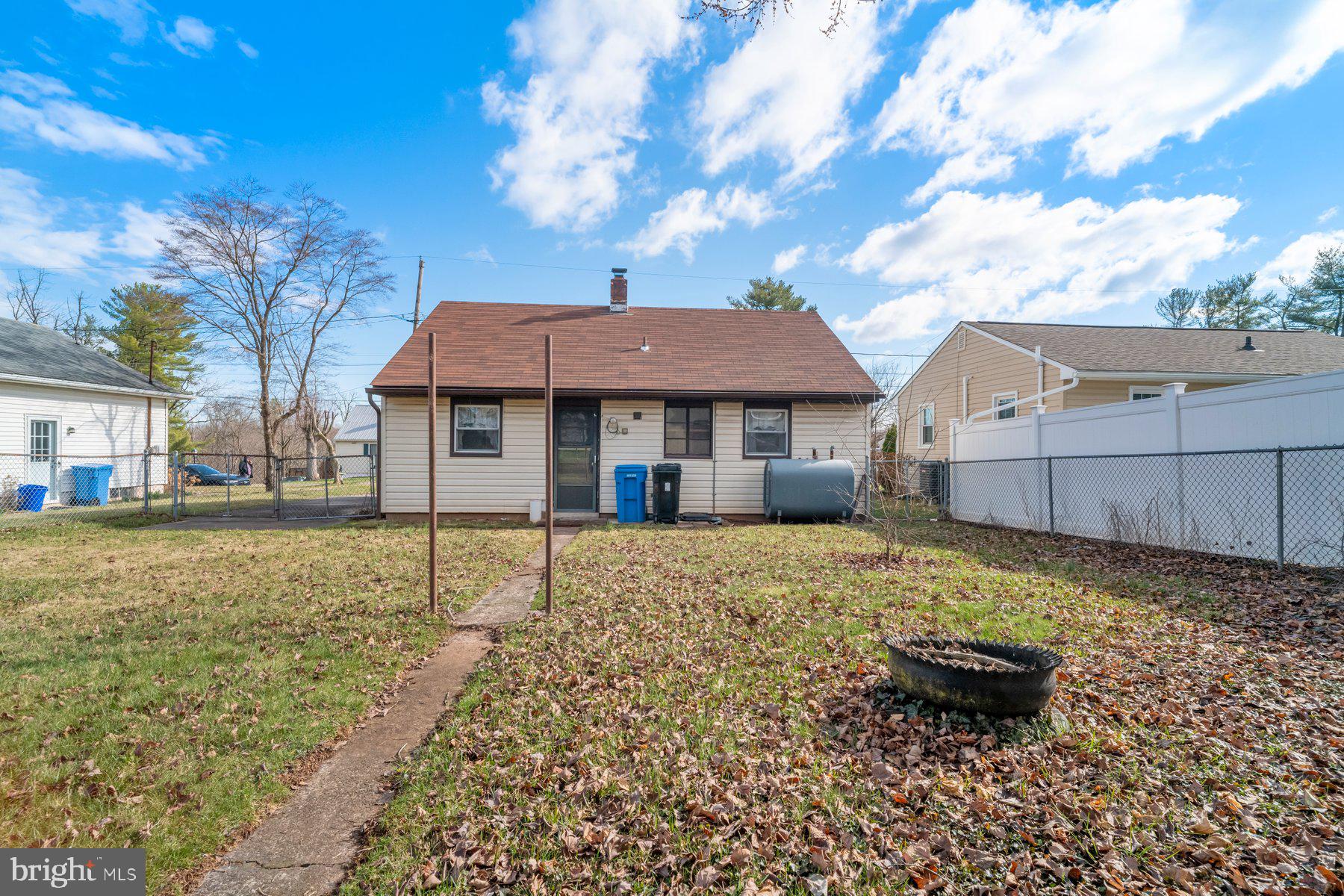23 Commerce Street Taneytown, MD 21787 - Photo 15 of 18 a backyard of a house with barbeque oven