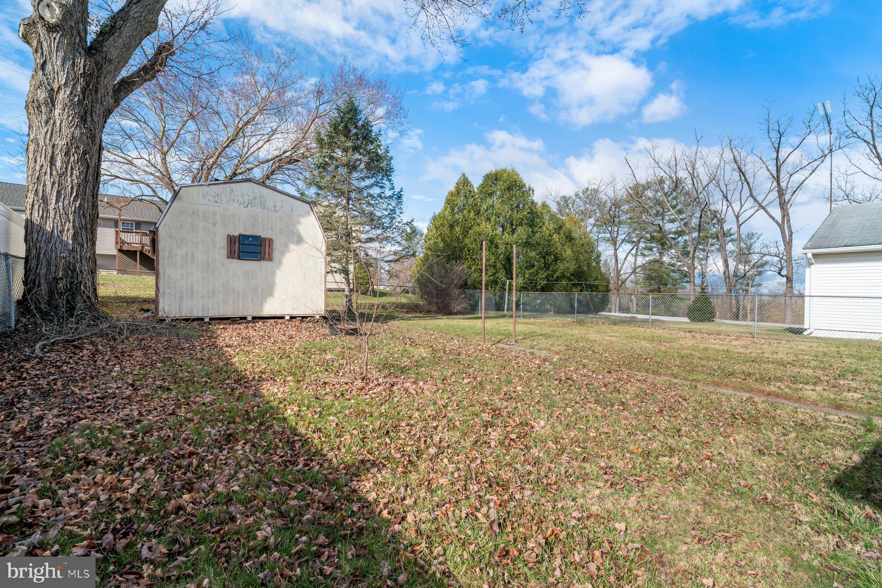 23 Commerce Street Taneytown, MD 21787 - Photo 16 of 18 a backyard of a house with lots of green space