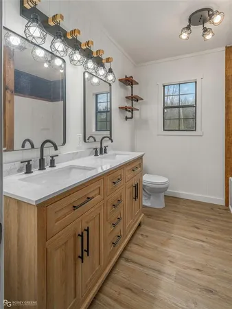 a bathroom with a shower and a bath tub