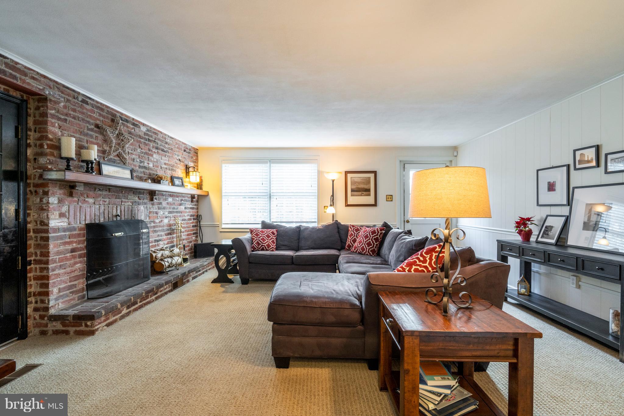 1635 Thomas Road Wayne, PA 19087 - Photo 14 of 31 The whole wall brick fireplace adds ambiance