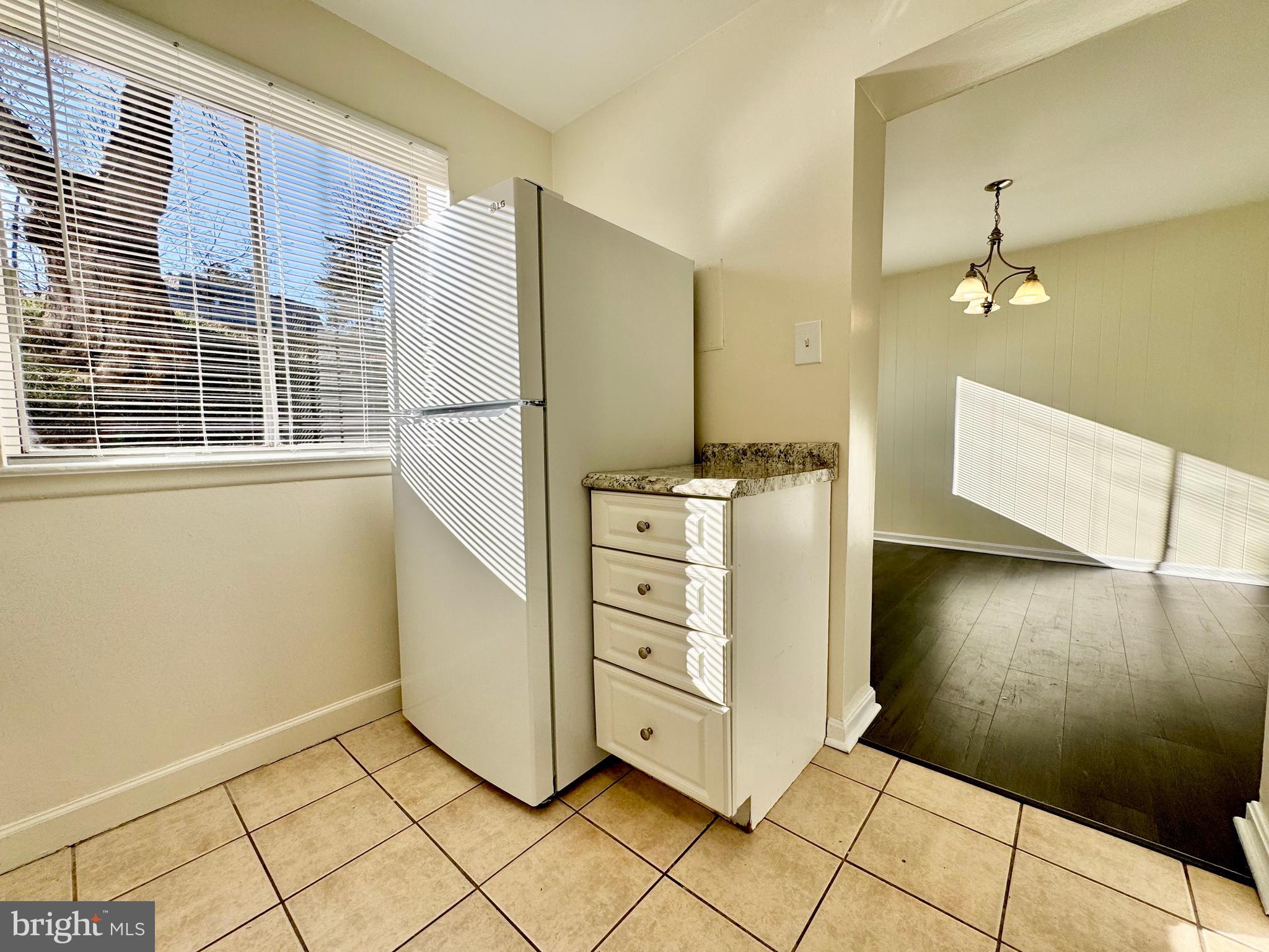 3936 Bel Pre Road, Unit 39362 Silver Spring, MD 20906 - Photo 14 of 32 a view of a kitchen with appliances and cabinets