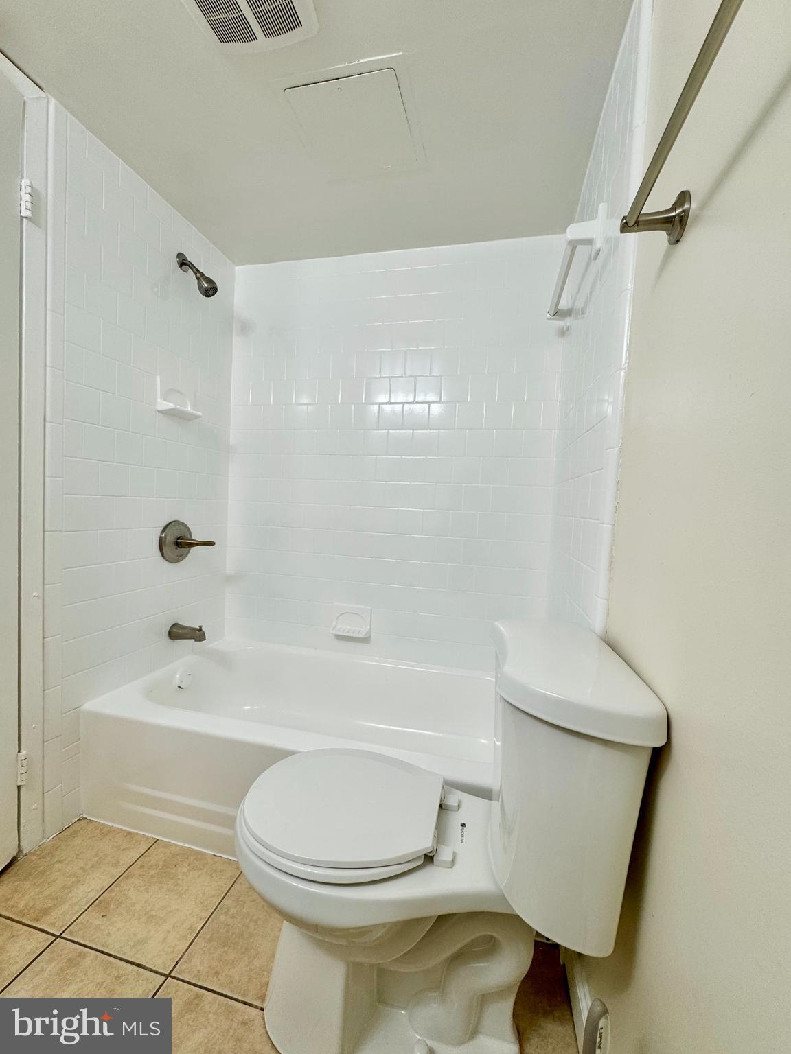 3936 Bel Pre Road, Unit 39362 Silver Spring, MD 20906 - Photo 24 of 32 a bathroom with a toilet and a bathtub
