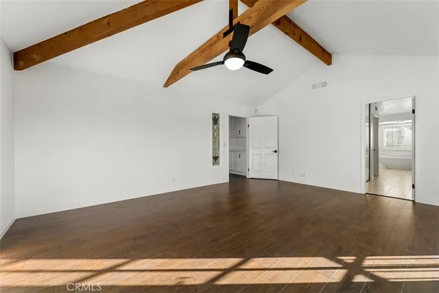 a spacious bathroom with a bathtub and a shower