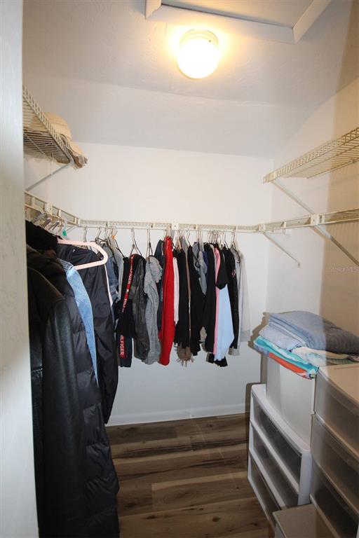 315 Southwest 54th Drive Gainesville, FL 32607 - Photo 18 of 36 a view of walk in closet with clothes and shoes