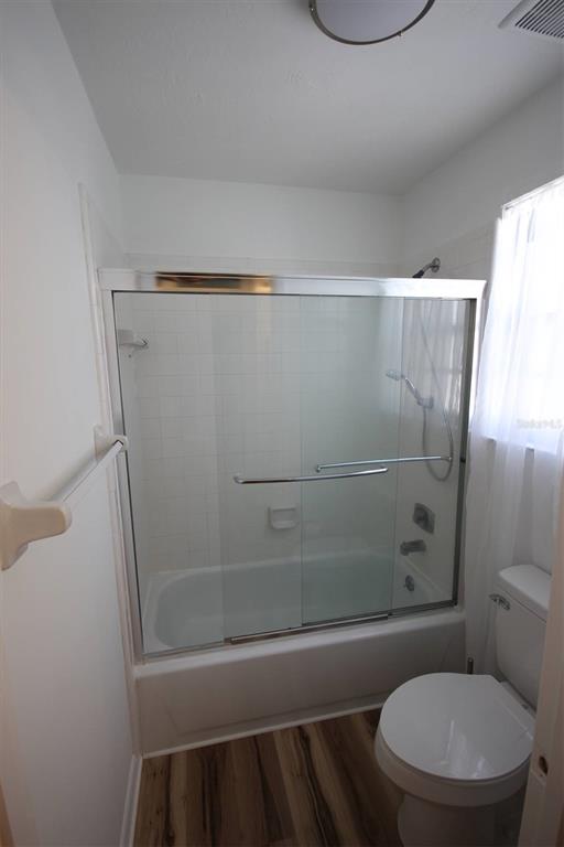 315 Southwest 54th Drive Gainesville, FL 32607 - Photo 20 of 36 a bathroom with a toilet and a shower