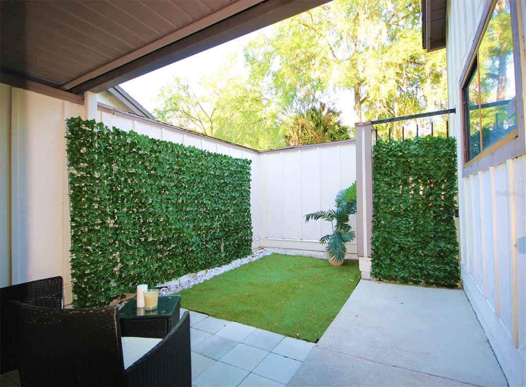 315 Southwest 54th Drive Gainesville, FL 32607 - Photo 2 of 36 a view of yard from a window