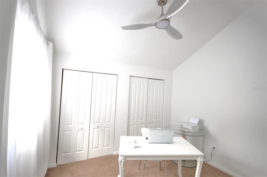 315 Southwest 54th Drive Gainesville, FL 32607 - Photo 24 of 36 a view of a room with a table and chairs