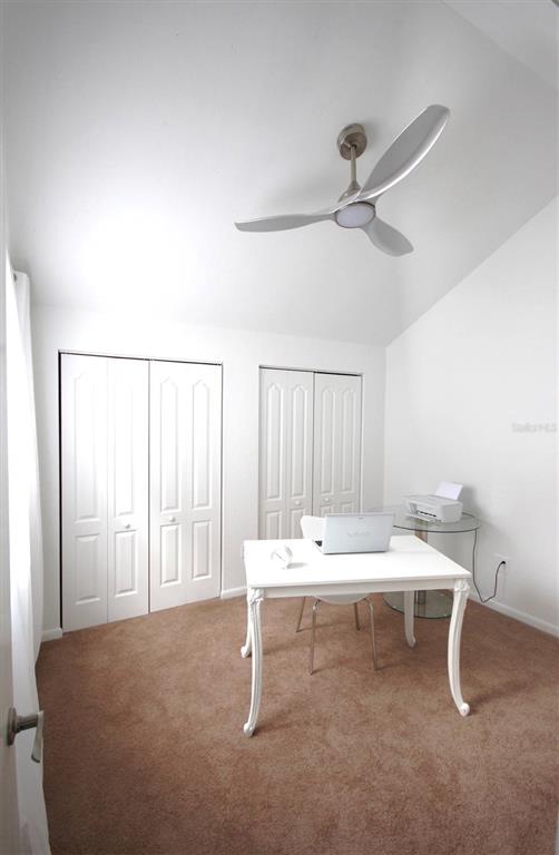 315 Southwest 54th Drive Gainesville, FL 32607 - Photo 25 of 36 a room with a bed and a table