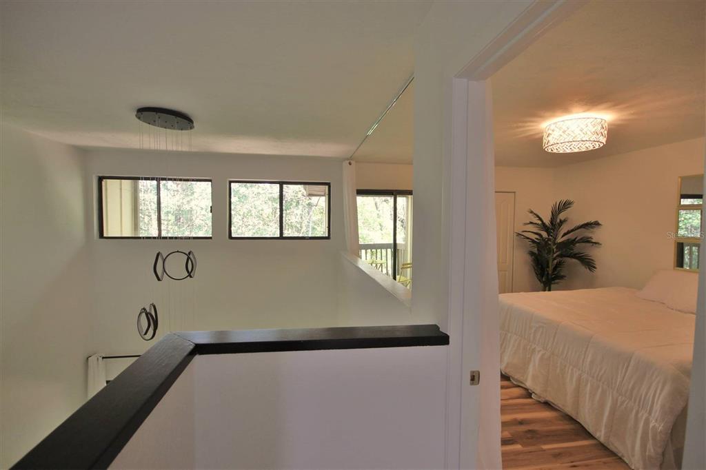 315 Southwest 54th Drive Gainesville, FL 32607 - Photo 26 of 36 a bedroom with a bed and a window