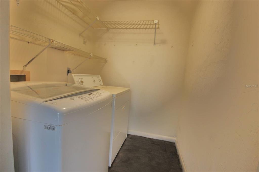 315 Southwest 54th Drive Gainesville, FL 32607 - Photo 32 of 36 a utility room with a sink dryer and washer