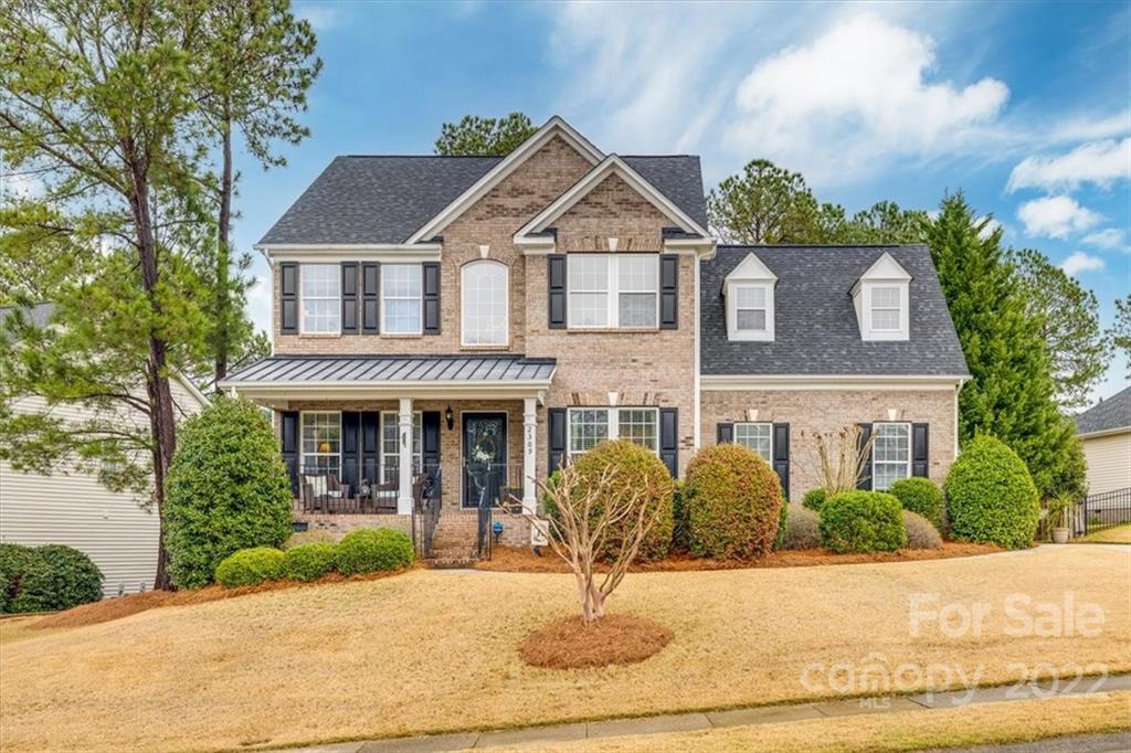 2309 Harvester Avenue Fort Mill, SC 29708 - Photo 1 of 47 a front view of a house with garden