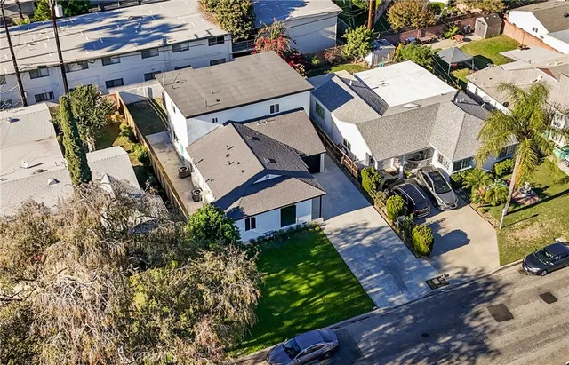 an aerial view of a house with garden