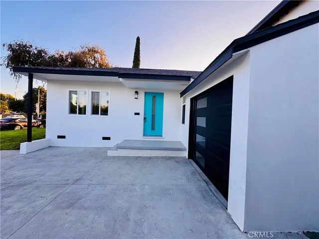 a view of wooden floor in front of a house
