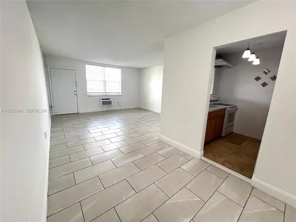 an empty room with window