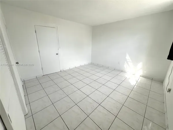 an empty room with closet
