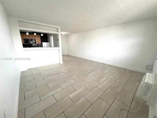 a kitchen with stainless steel appliances granite countertop a sink and a stove