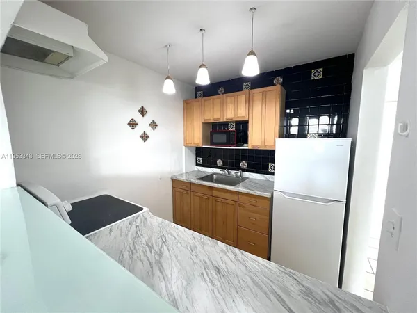 an empty room with a bench