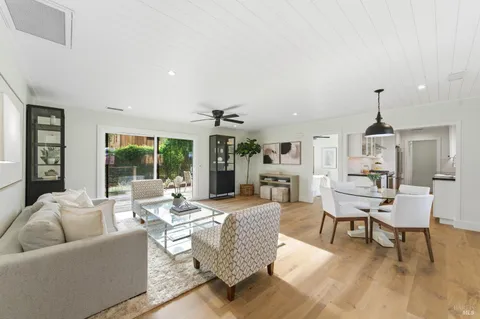 a kitchen with stainless steel appliances a stove and a cabinets