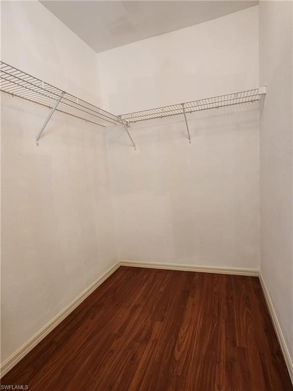 12796 Vista Pine Circle Fort Myers, FL 33913 - Photo 15 of 25 a view of a room with wooden floor