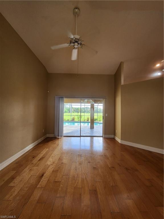 12796 Vista Pine Circle Fort Myers, FL 33913 - Photo 4 of 25 a view of empty room with wooden floor and fan